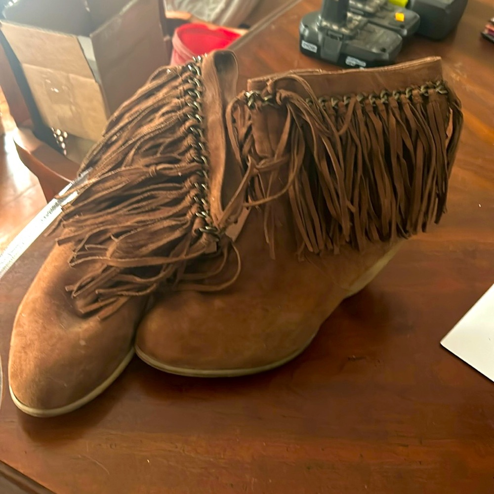 Used brown suede tassel boots with metal studs on back